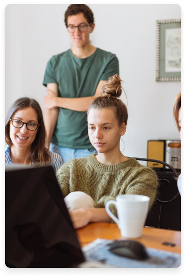 Female programmer analyzing data structures on computer screen