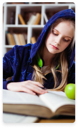Student studying Big O notation with textbooks and notes